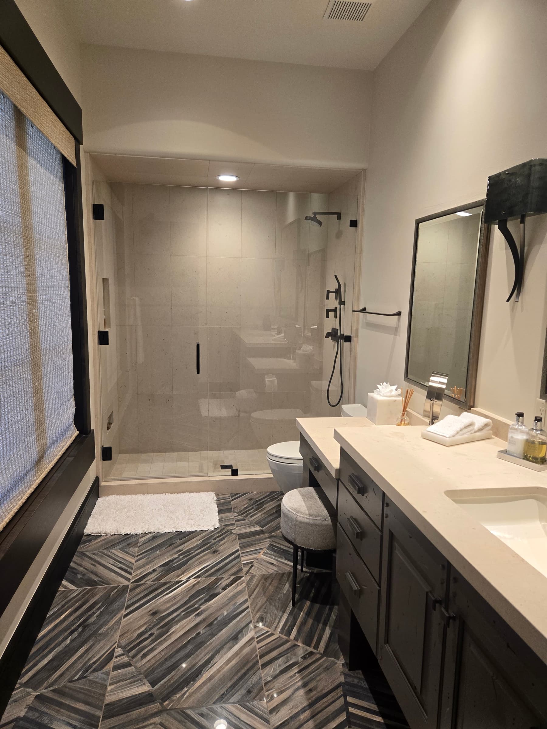 Park City bathroom remodel with walk-in shower and herringbone tile floor