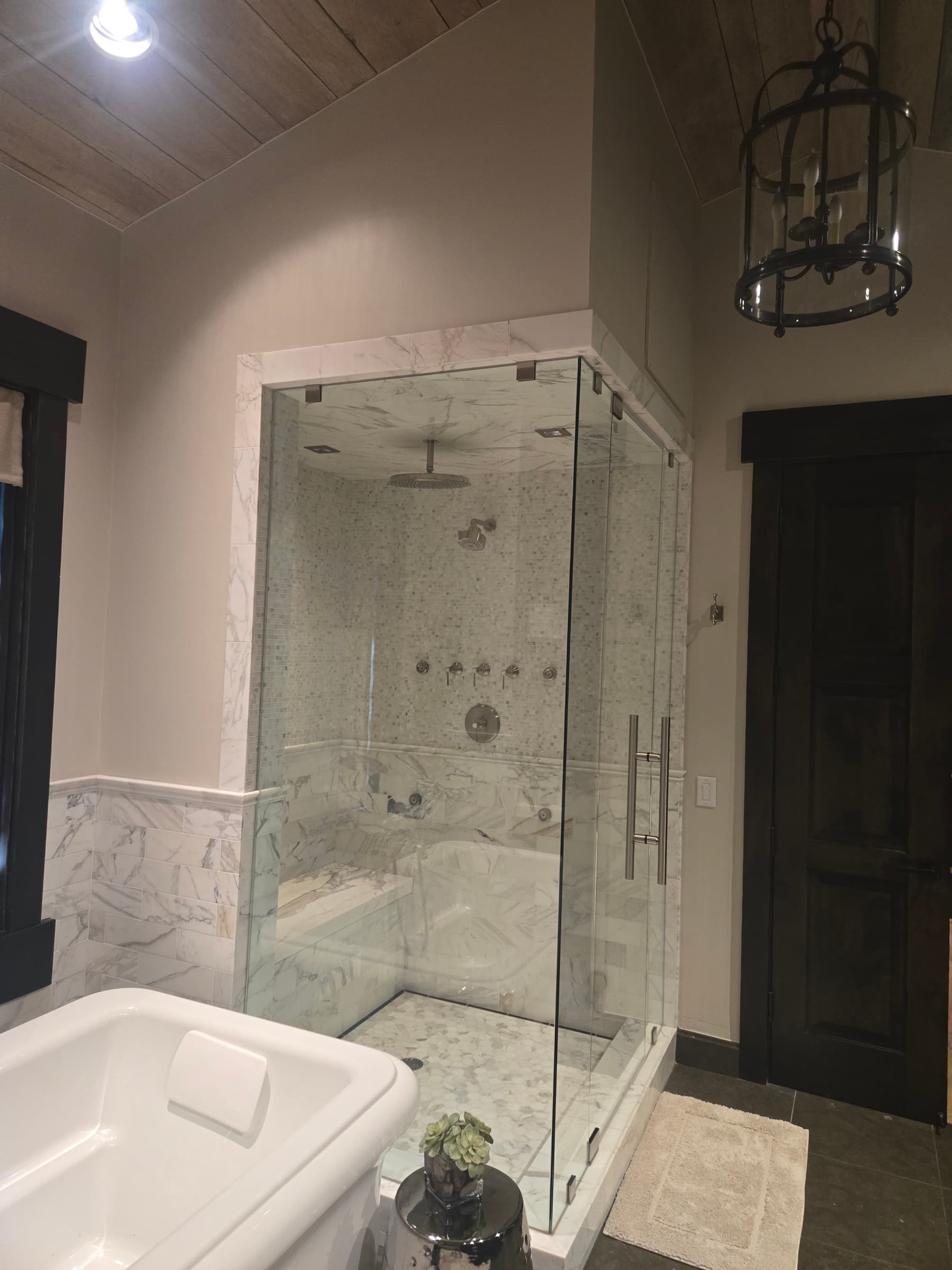 Park City bathroom remodel with marble steam shower and freestanding tub