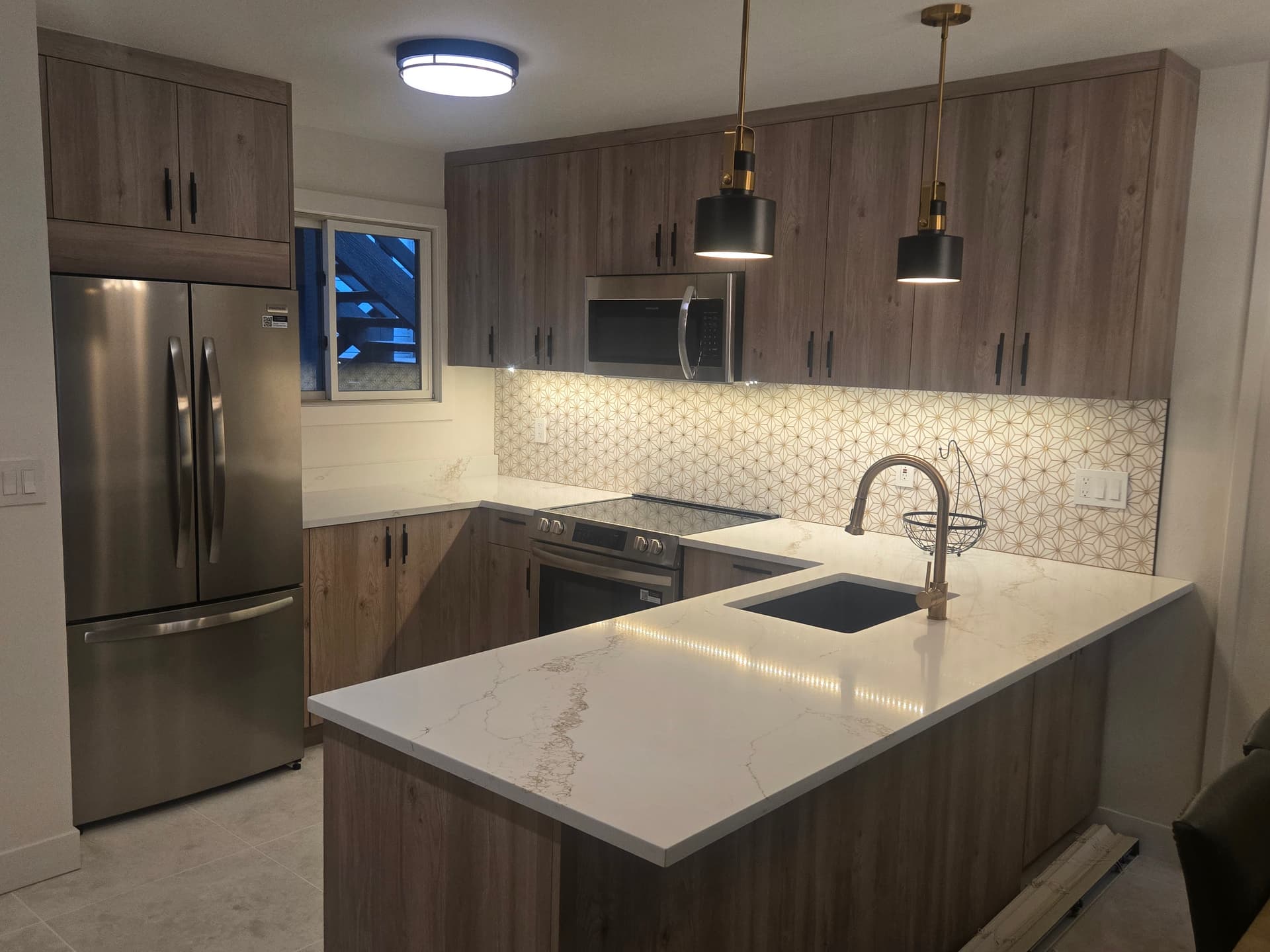 Kitchen Remodeling Park City - Grey Cabinets, Quartz Peninsula and Patterned Backsplash Kitchen Remodel